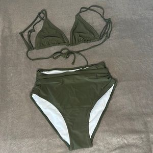 Woman’s olive green bathing suit